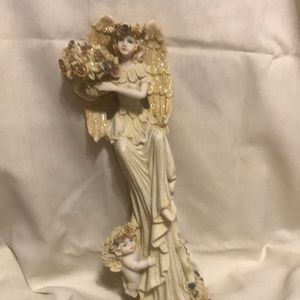 Vintage Three Hands Corp. Angel Figurine carrying flowers and with a Cherub